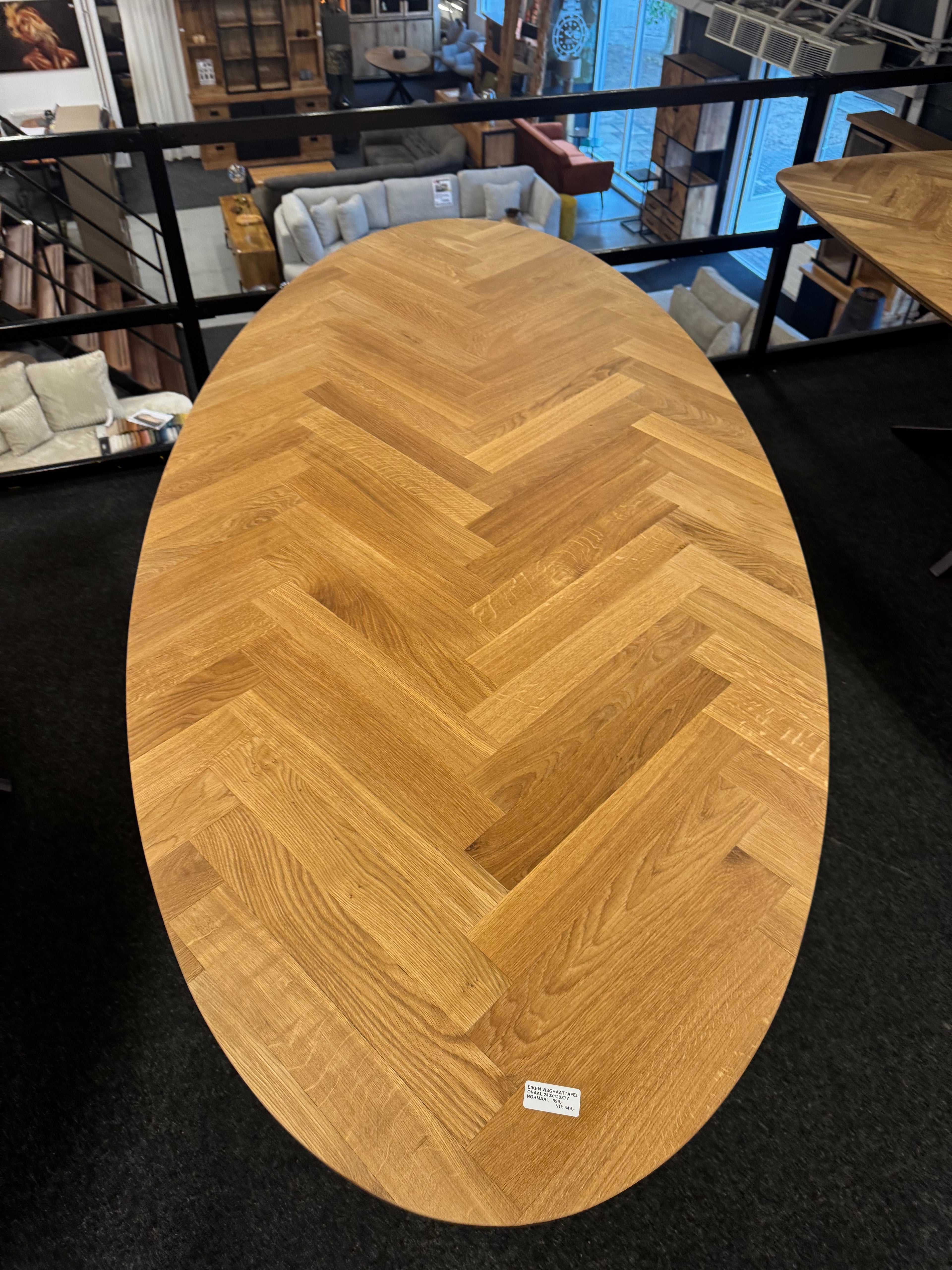Ovale eiken visgraattafel 180x100x77 5cm dik blad